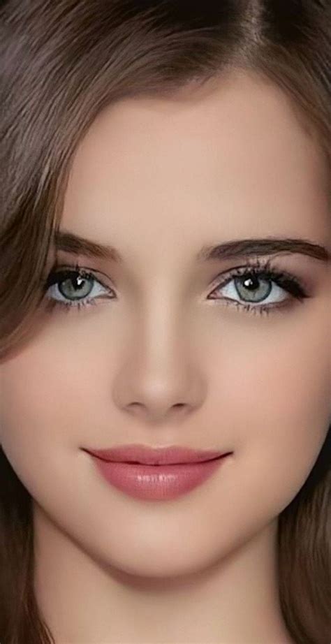 A Woman With Blue Eyes And Brown Hair