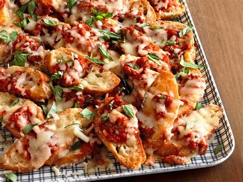 Bake 10 to 11 minutes or until crispy and sizzling. Pizza Nachos Recipe | Food Network Kitchen | Food Network
