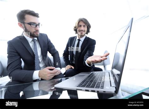 Two Businessmen Working On A Project Together Stock Photo Alamy