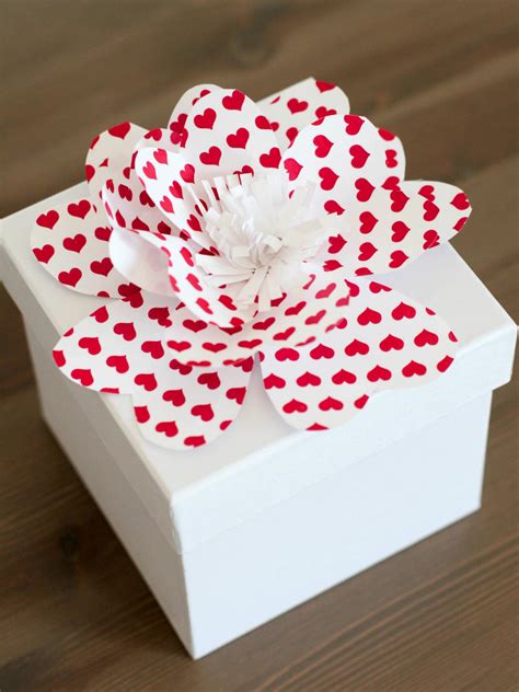 Use a craft knife to score the paper along the dotted lines. Simple Instructions for Making Decorative Paper Flowers ...