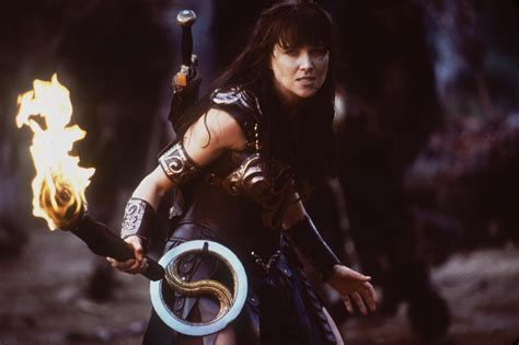 remember tough as nails xena from xena warrior princess she looks just as hot 11 year later