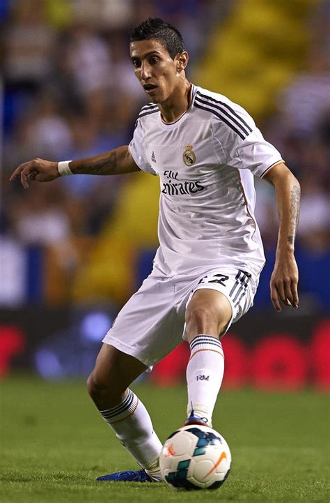 Still married to his wife jorgelina cardoso? Ángel Di María of Real Madrid in action during the La Liga ...