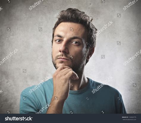 Young Man With Thoughtful Expression Stock Photo 110050775 Shutterstock