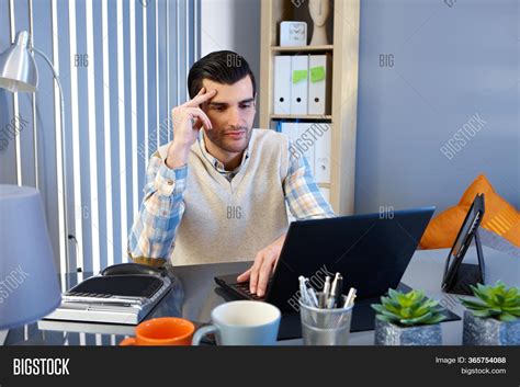 Young Man Sitting Desk Image And Photo Free Trial Bigstock