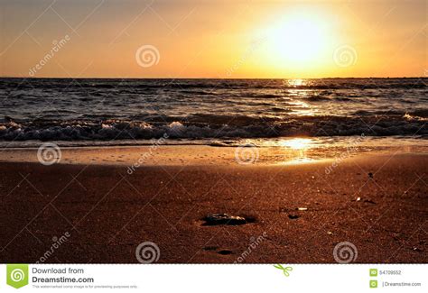 Beautiful Colors At Sunset Sea Sky And Sand Stock Photo
