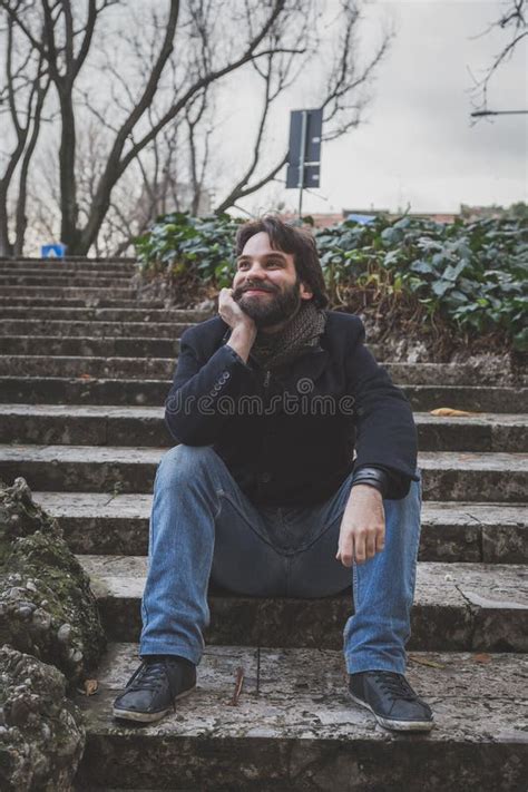 Young Handsome Bearded Man Posing In The City Streets Stock Image