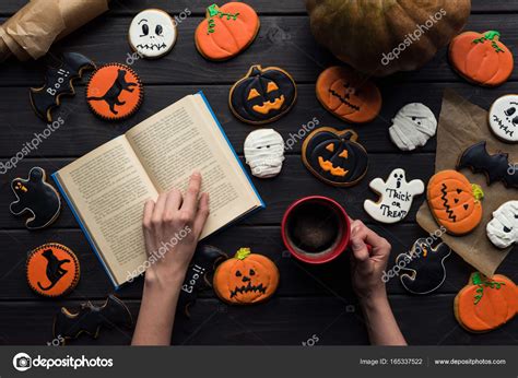 Woman Reading Book On Halloween Stock Photo VadimVasenin 165337522