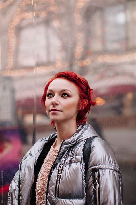 Attractive Redhead Girl Standing By Surreal Reflection Of Gum Moscow By