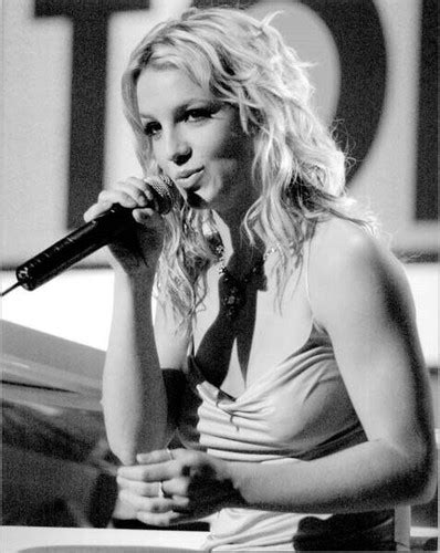 britney spears on stage holding microphone 8x10 inch press photo the movie store