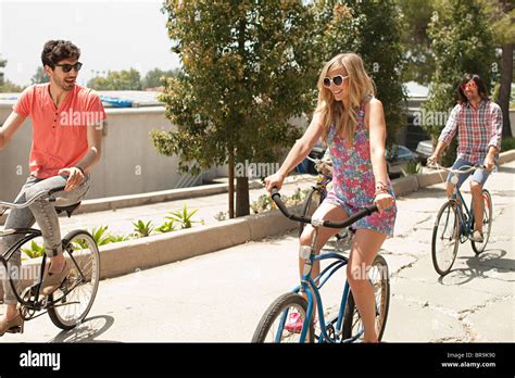 Young Friends On Bicycles On Vacation Stock Photo Alamy