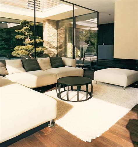 Modern Japanese Living Room With A Black Coffee Table And Shag Rug In