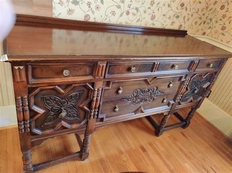 Antique Buffet Cabinet With Beautiful Wood Detailing