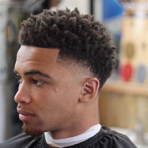 A low skin fade shaves a lot of the hair away, leaving the neck bare and the sides of the head clear of hair above the ears. 25 Taper Fade Haircuts for Men to Look Awesome - Haircuts ...