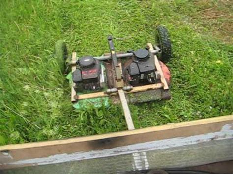 This motorless pull behind mower is made from junk aday. Homemade tow mower. - YouTube
