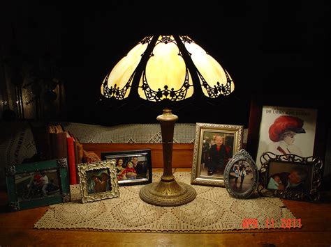 This is a large and impressive. Miller Lamp Company...Eight Slag Glass Panels...Signed And ...