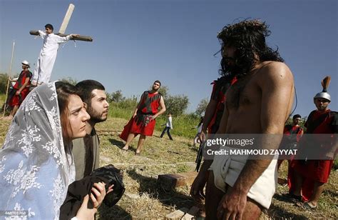 Lebanese Christians Take Part In A Reenactment Of The Crucifixion Of