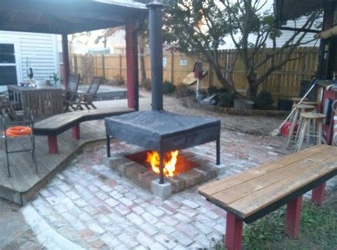 The fire pit is an open container such as a bowl or dish mounted on a stand. Chimney over the firepit. | DIY projects | Pinterest | The ...