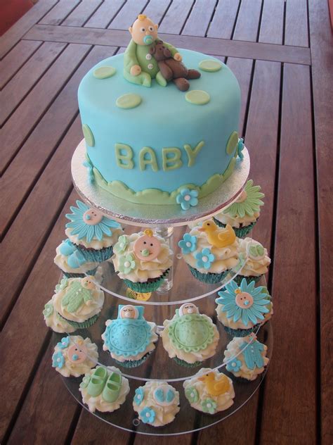 All of these cake tutorials can be found on mycakeschool.com. Mossy's Masterpiece - Baby boy baby shower cake/cupcakes ...