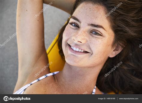 Smiling Girl Lying On Back Stock Photo By Sanneberg