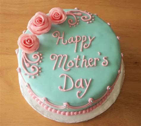 Chocolate cakes, carrot cake, apple cake, and more. Pink & Blue Mother's Day Cake | Mothers day cake, Mothers day cakes designs, Strawberry birthday ...