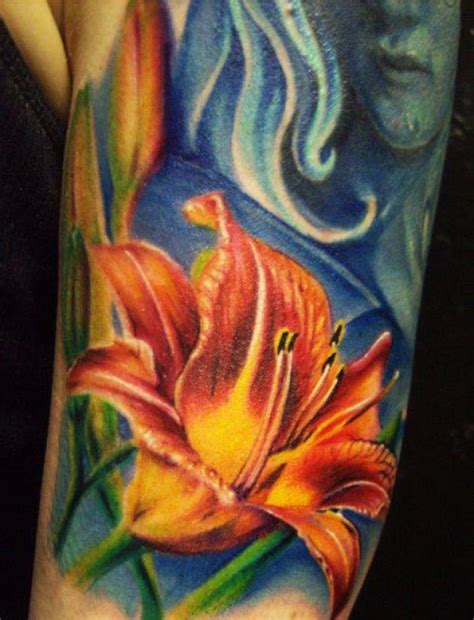 colorful stargazer lily tattoo on sleeve