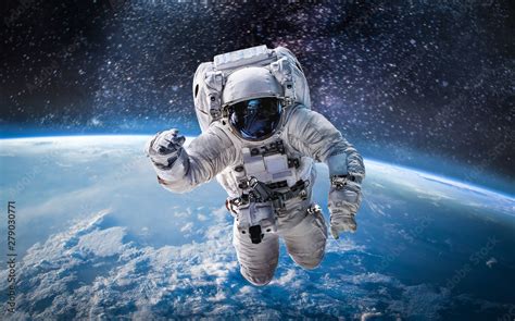 Astronaut In The Outer Space Over The Planet Earth Abstract Wallpaper