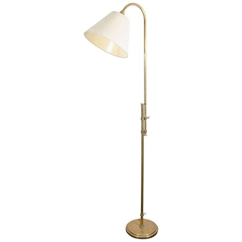 A Midcentury Brass Floor Lamp with Adjustable Pole at 1stDibs