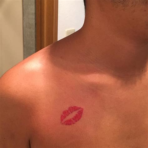 It could be meant for showcasing the love and affection for children and spouse. kiss: Kiss Mark On Neck
