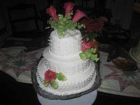 The ermine is perfect with it. This was a wedding cake that i did..It was red velvet cake ...