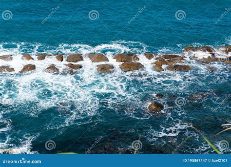 Shoreline With Rock Wave Breaker Wonderful Turquoise Blue Ocean Stock