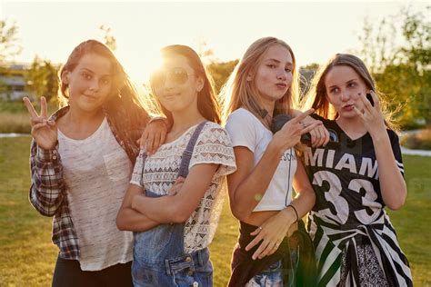 Four Teenage Girls Fooling Around 146012 Youworkforthem