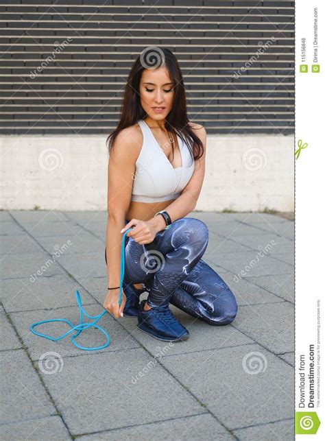 Fitness Woman Resting After Jumping Rope Stock Photo
