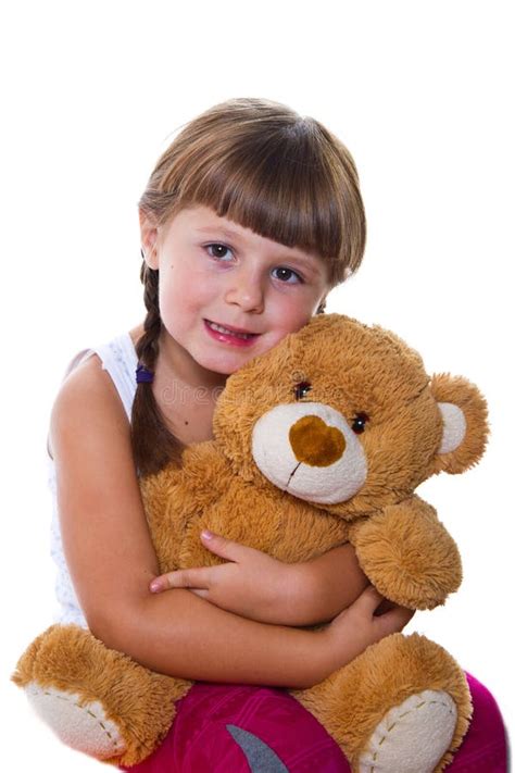 Adorable Toddler Girl Hugging A Teddy Bear Stock Photo Image Of