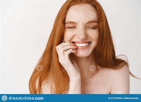 Close Up Of Happy Redhead Woman With Pale No Makeup Skin And Perfect