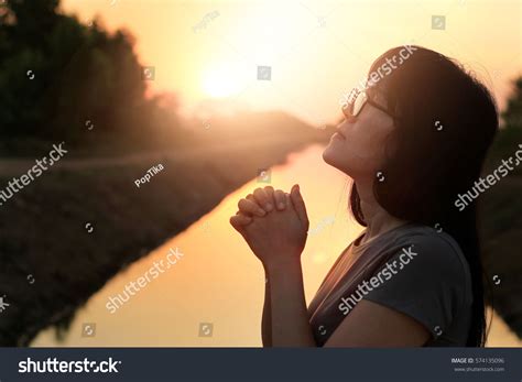 Woman Praying Hands Together On Nature Stock Photo 574135096 Shutterstock