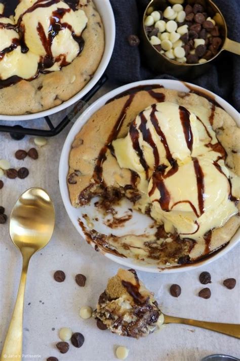 Two Bowls Filled With Ice Cream And Chocolate Chips