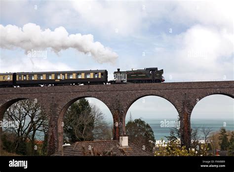 Steam Locomotive Crossing The Viaduct At Broadsands South Devon Stock