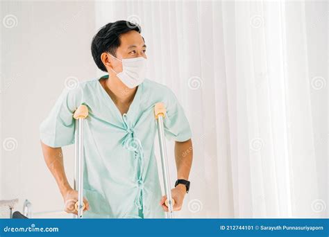 Young Patient Walking With Crutch Walker Stock Image Image Of Indoors