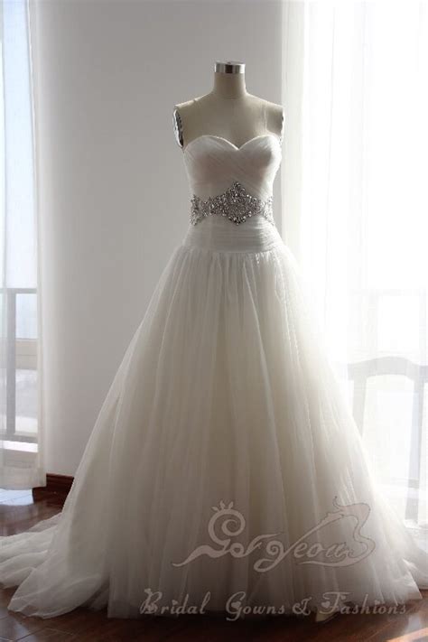 Strapless Misty Tulle Ball Gown Features Crystal Hand Beaded Dropped