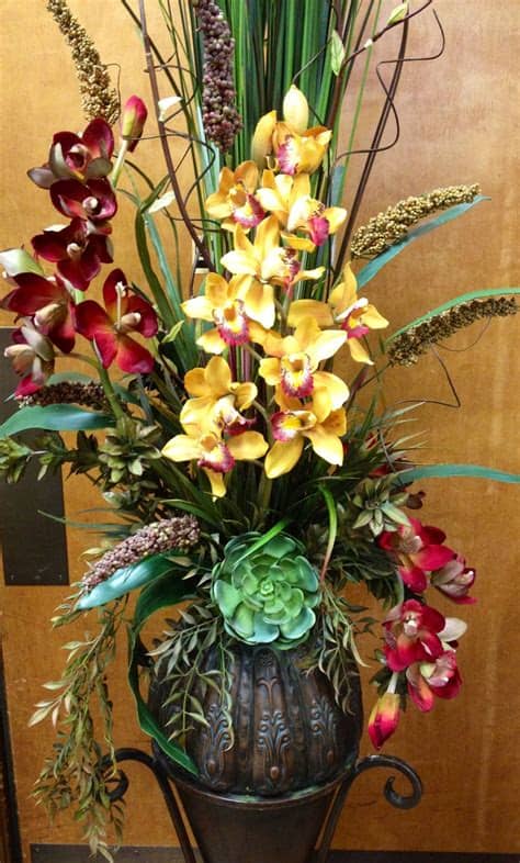 As an industry leader in floral and décor in the greater toronto area, we aim at building meaningful client. #Orchid arrangement in metal vase. Designed by Arcadia ...