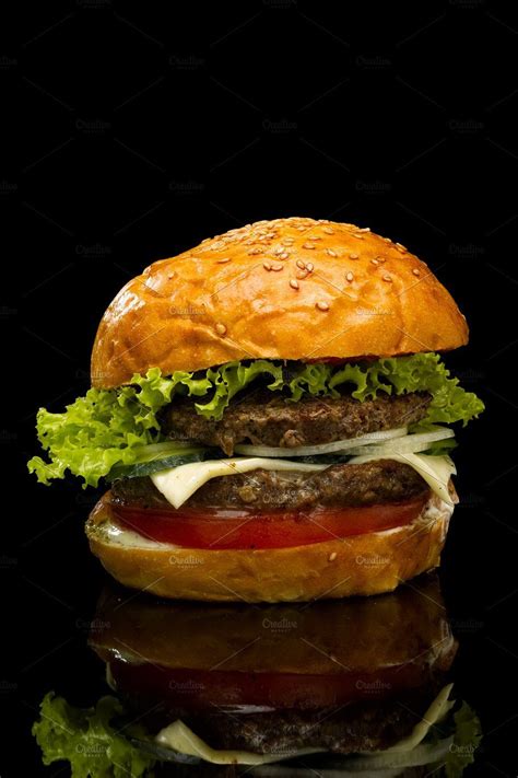 Burger On A Black Background Stock Photo Containing Burger And Food