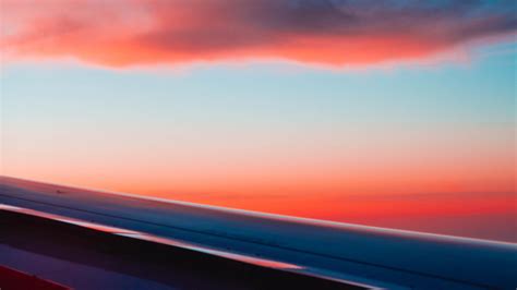 Download Wallpaper 2560x1440 Airplane Wing Plane Clouds