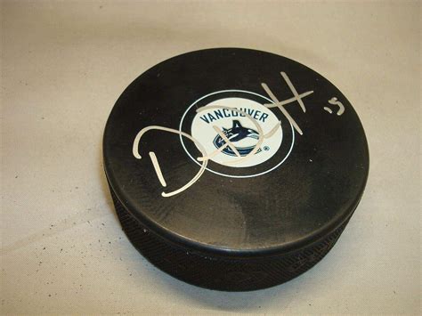 derek dorsett signed vancouver canucks hockey puck autographed 1a autographed nhl pucks at