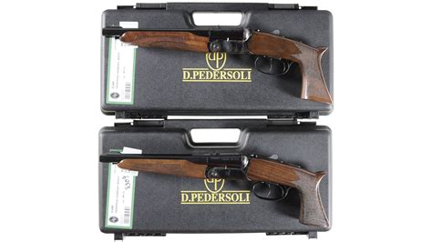 Two Pedersoli Howdah Double Barrel Pistols W Cases Rock Island Auction