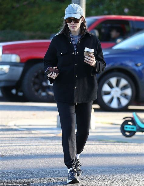 Jennifer Garner Bundles Up For A Morning Walk After Grabbing Coffee In