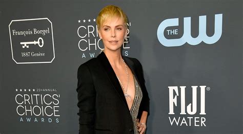 Charlize Theron Dazzles In Striped Slit Dress Critics Choice Awards