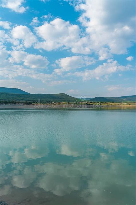 Beautiful Landscape With Turquoise Lake Reflection Of Blue Sky And