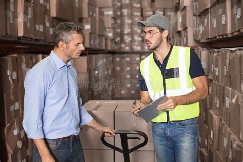 Warehouse Manager Talking With Worker Stock Image Image Of Shipping