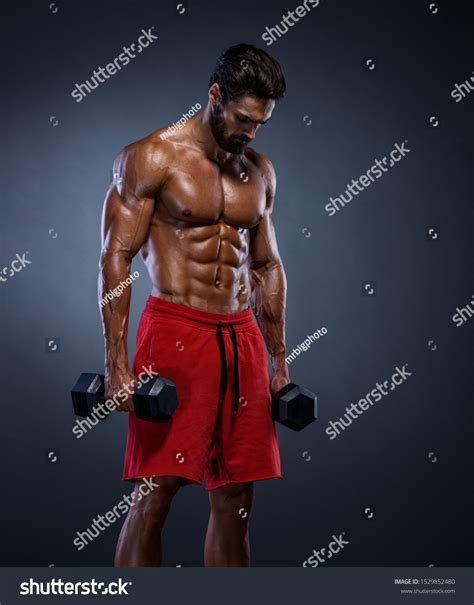 Handsome Muscular Men Bodybuilder Lifting Weights Stock Photo