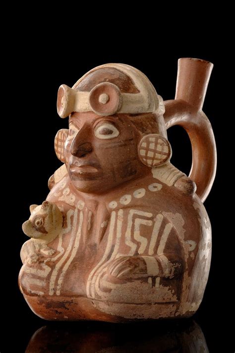 moche man with feline cub ancient pottery archaeology ancient